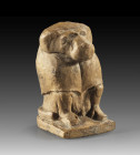 Limestone figure of Thot as a sitting baboon. On the shoulder of this unfinished piece Schlögl and Buxtdorf found traces of the cartouche of pharao Ha...