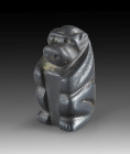 Crouching baboon of Haematite, H 2.5cm. Predynastic, Naqada I-II, 3500 - 3150 BC. Intact. Hockender Pavian. Prädynastisch, Nagada I-II, 3500 - 3150 v....