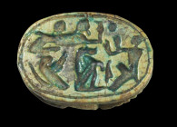Scarab of green glazed steatite with longitudinal drilling, L 1.9cm. On the underside with inscription in enigmatic spelling: The All-Lord Re praises ...