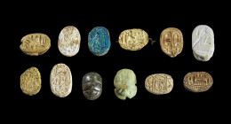 Collection of scarabs: L 1.8 - 2.3cm. Made of steatite with longitudinal drilling, one piece of limestone with glaze and one of stone. Hieroglyphs on ...