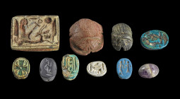 Collection of scarabs of steatite with longitudinal drilling, L 1.2 - 2.3cm. On the underside with hieroglyphs. A piece of black jasper, a piece of la...