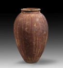 An elegant, ovoid vessel made of orange clay with red slip. Early Dynastic, about 3.000 BC. Ex collection Prof.Hermann Schlögl, acquired at Galerie Gü...