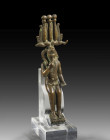 Bronze statuette of Harpokrates: H 17cm. Fully cast bronze. Enthroned boy placing the index finger of his right hand on his lips in the typical gestur...
