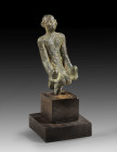 Bronze statuette of a kneeling priest, H 5.5cm, with base 9.5cm. Late period, 6th - 4th century BC. Green patina, corroded spot at the backside. Statu...