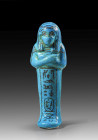 Shabti of Queen Hadjet Rameri. 19st Dynasty, 1054 - 1032 BC. H 11.9cm. Blue-glazed faience with black paint. Mummy-shaped ushabti with a smooth, three...