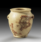 Early Dynastic stone vessel. 3032 - 2707 BC. H 7.1cm, ø 6.5cm. Bulbous miniature pot with wide mouth and two eyelets made of beige breccia with reddis...