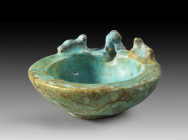 A turquoise faience bowl with animals on the rim. H 3.8cm. Late Period, 6th - 3rd century BC. Intact. Fayenceschale mit aufgesetzten Tieren. Spätzeit,...