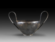 Prae-Achaemenid silver kantharos. 8th - 7th century BC. 135g. H 10.2cm, W with handles 16.6cm, ø bowl 10.6cm. Deep and convex bowl with two large hand...