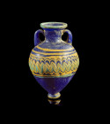 Eastern Mediterranean core-formed glass amphoriskos with zig-zag-pattern. H 8cm. 6th - 5th century BC. Intact. Amphoriskos in Sandkerntechnik. Östlich...