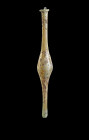 Large yellow unguentarium. H 29cm. 1st - 2nd century AD. With iridescene, professionally restored out of big fragments. Großes Unguentarium. Östlicher...