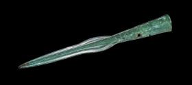 Spearhead with a flame-shaped, single-stepped blade and a raised central ridge with notches. Two mounting holes in the socket. Central Europe, Bronze ...