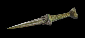 Bronze dagger. Western European Early Bronze Age, 1800 - 1500 BC. L 16.3cm. Solid cast. With central ridge on both sides of the blade and square and c...