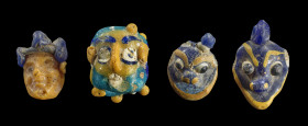 Sammlung Gesichtsperlen. Phönizisch, 5. - 1. Jh. v. Chr. a) H ca. 2cm. Aus verschieden farbigem Glas. Röhrenförmig mit drei Gesichtern mit den charakt...