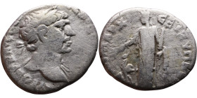 Trajan (98-117) Arabia: Bostra. Didrachm. Obverse: aureate head right, slight drapery Reverse: Arabia standing facing, head left, holding branch and b...