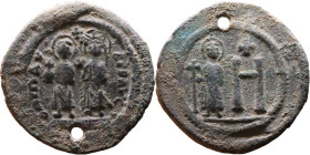 Maurice Tiberius (582-602) Follis Obverse: Maurice and the Empress Constantina, both nimbate, standing facing on dais side by side, the emperor holdin...