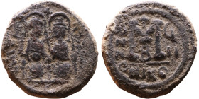 Justin II and Sophia (565-578) Follis Obverse: DN IVSTINVS PP AVG Justin and Sophia on thrones Reverse: Large M between ANNO and regnal year, above cr...