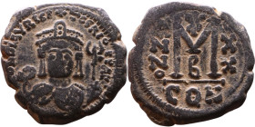 Maurice Tiberius (582-602) Follis Obverse: Crowned bust facing, wearing consular robes, holding mappa and eagle-tipped scepter , Reverse: Large M cros...