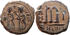 Phocas and Leontia.(602-610) Follis. Obverse: Standing Phocas and Leonita Reverse: Large m between ANNO and regnal year.

26mm 10,67g