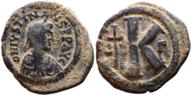 Justinian I (527-565) Half Follis. Obverse: DN IVSTINIANVS PP AVG, Armoured facing bust holding globus Reverse: Large M between ANNO and regnal year
...