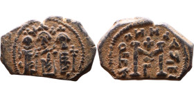 Heraclius, Martina and Heraclius Constantine (610-641) Follis Obverse: From left, Martina, Heraclius, heraclius Constantine Reverse: Large M, ANNO,
...