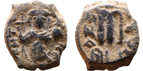 Constans II (641-668) Follis. Obverse: Imperial figure holding cross and globus Reverse: m and inscription

19mm 5,17g
