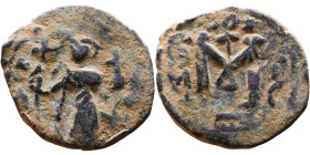 Constans II (641-668) Follis. Obverse: Imperial figure holding cross and globus Reverse: m and inscription

22mm 3,81g