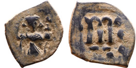 Constans II (641-668) Follis. Obverse: Imperial figure holding cross and globus Reverse: m and inscription

18mm 3,42g