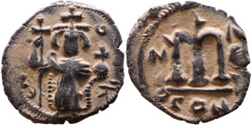 Constans II (641-668) Follis. Obverse: Imperial figure holding cross and globus Reverse: m and inscription

19mm 2,15g

Artificial sand patina