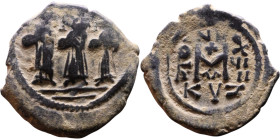 Heraclius, Martina and Heraclius Constantine (610-641) Follis Obverse: From left, Martina, Heraclius, heraclius Constantine Reverse: Large M, ANNO,
...