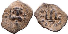 Constans II (641-668) Follis. Obverse: Imperial figure holding cross and globus Reverse: m and inscription

22mm 3,70g