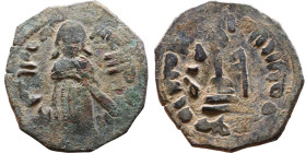 al-Malik ibn Marwan (687-705) Follis. Obverse: Standing caliph Reverse: Modified cross potent set on steps

20mm 2,75g