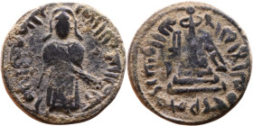 al-Malik ibn Marwan (687-705) Follis. Obverse: Standing caliph Reverse: Modified cross potent set on steps

18mm 2,80g