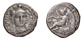 SICILIA - MORGANTINA (circa 344-317 a.C.) LITRA gr.1,04 - D/Testa di Atena di fronte a tre quarti a d. con elmo con tripla cresta R/Nike seduto s. sul...
