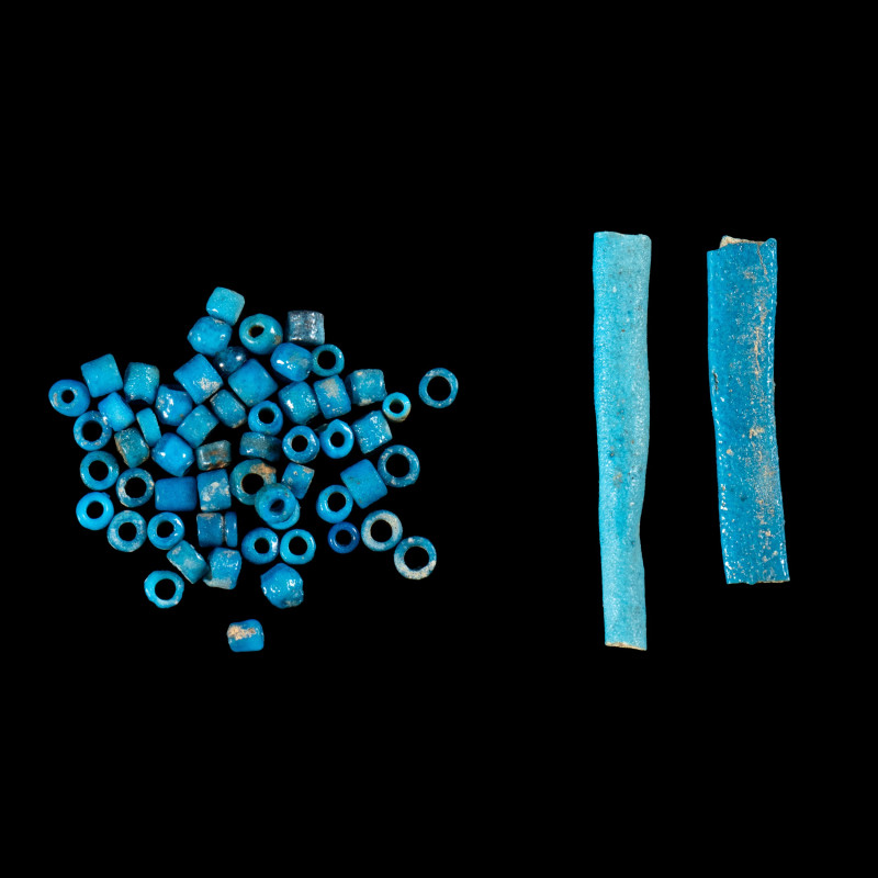 A GROUP OF 59 EGYPTIAN TURQUOISE FAIENCE BEADS.
New-Kingdom, ca. 1550-1069 BCE...