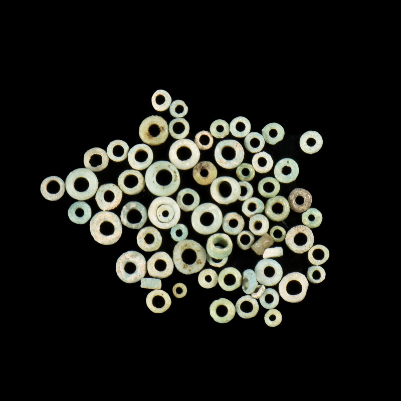 A GROUP OF 67 EGYPTIAN FAIENCE BEADS.
New-Kingdom,ca. 1550-1069 BCE
L. min 3 m...