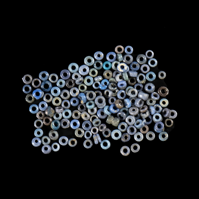 A GROUP OF 150 EGYPTIAN FAIENCE AND GLASS BEADS.
New-Kingdom,ca. 1550-1069 BCE...