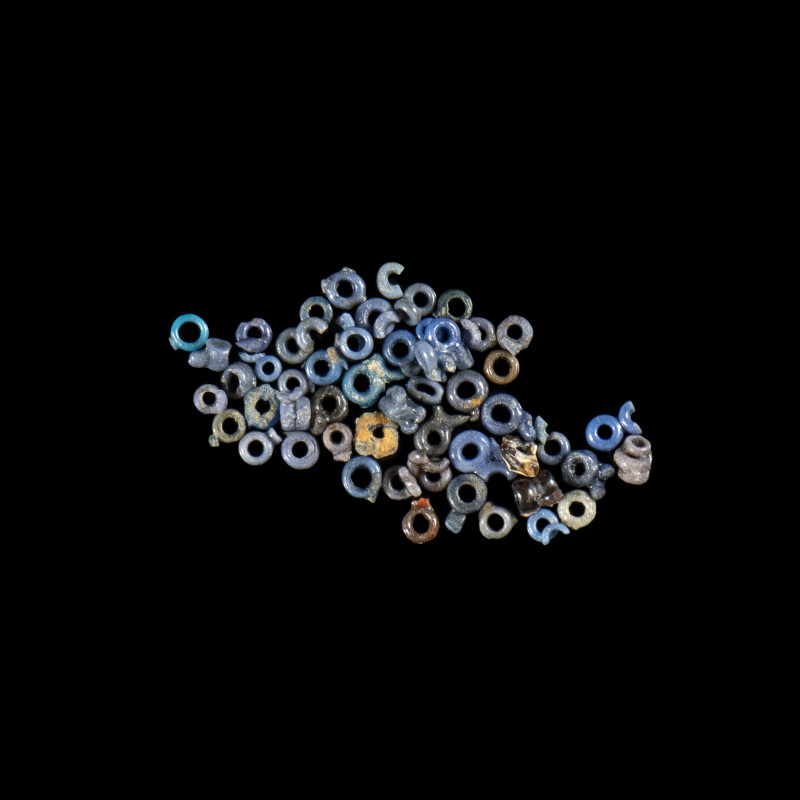 A GROUP OF 48 EGYPTIAN FAIENCE AND GLASS BEADS.
New-Kingdom,ca. 1550-1069 BCE
...
