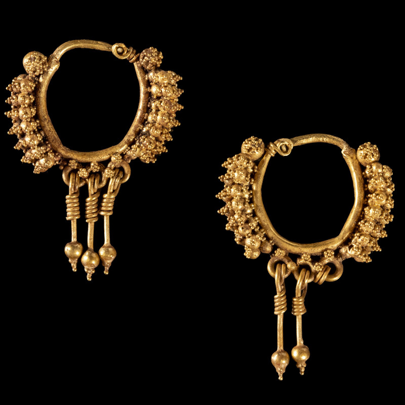 A PAIR OF ROMAN GOLD EARRINGS.
2nd century A.D.
H. 27 mm

Provenance
Former...