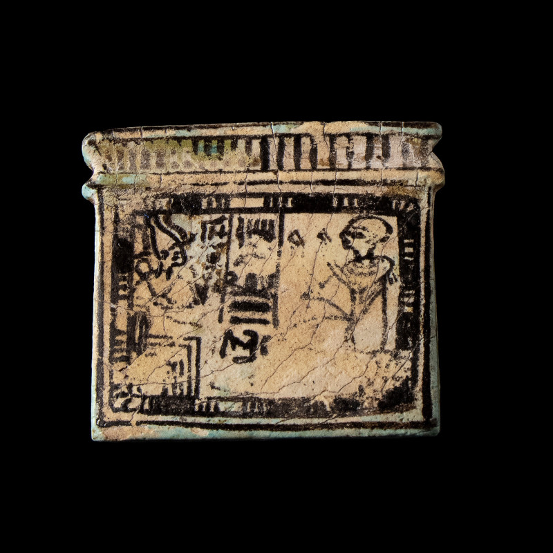 AN EGYPTIAN FAIENCE PECTORAL
New-Kingdom, Dynasty 19, 1295-1069 B.C.
Dim. 8,5 ...