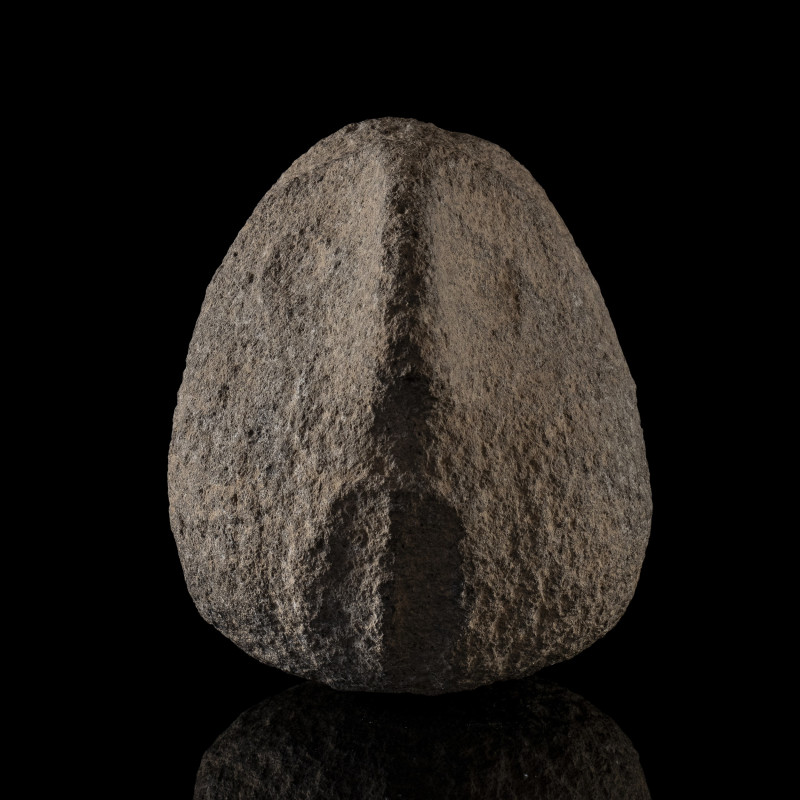 A RARE HITTITE STONE STYLIZED HEAD.
Ca. 1800 BCE
H. 15 cm

Provenance
Forme...
