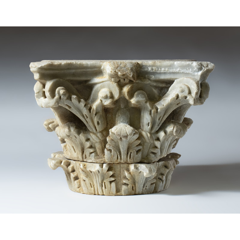 A ROMAN MARBLE COMPOSITE CORINTHIAN STYLE CAPITAL.
1st-2nd century A.D.
H. 32 ...
