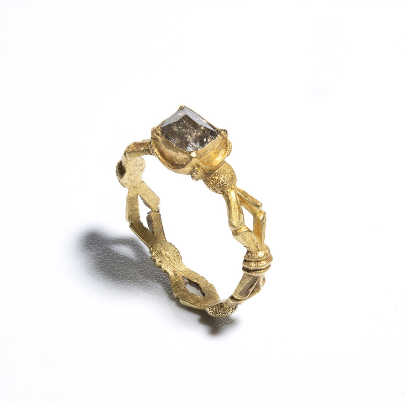 * A RENAISSANCE GOLD RING SET WITH A FACETED ROCK CRYSTAL.
Mid 16th century
H....