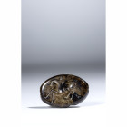 AN URUK STONE STAMP-SEAL.
Proto-Elamite, 4000-3000 BCE
Dim. 21,5 x 14,7 mm

Provenance
Swiss private collection of the Numismat Giovanni Maria St...