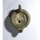 A LOT OF 2 ROMAN OIL LAMPS.
1st-2nd century A.D.
L. 10,7 cm ; 12 cm

Provenance
Swiss private collection of the Numismat Giovanni Maria Staffieri...