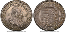 Maximilian Taler 1615-CO AU58 NGC, Hall mint, KM188.3, Dav-3321. Displaying deep olive tones when static, but glowing with moss, peach, and violet whe...