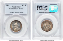 German Colony. Wilhelm II 1/2 Rupie 1891 MS65 PCGS, Berlin mint, KM4. A Gem example whose fields are adorn in a swirling luster that is further accent...