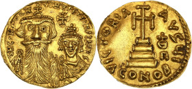Constans II (641-668)
Solidus ND, Rome.
Av. Bustes couronnés de face de Constans II et de Constantin IV.
Rv. Croix potencée posée sur trois degrés.
4,...