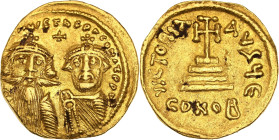 Constans II (641-668)
Solidus (654-659), Constantinople.
Av. Bustes couronnés de face de Constans II et de Constantin IV.
Rv. Croix potencée posée sur...