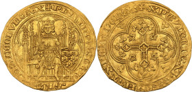 Philippe VI (1328-1350)
Écu d'or à la chaise (1337) 1ere émission.
Av. Le roi assis dans une stalle gothique, couronné, tenant de la main droite l'épé...