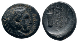 KINGS OF MACEDON.. Alexander III the Great (336-323 BC). Ae. Miletos

Obv: Head of Heracles right. wearing lion skin headdress. paws tied before nec...